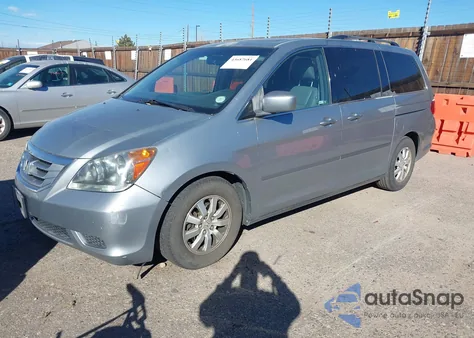 2010 Honda Odyssey Ex-L z USA, uszkodzony, nr VIN 5FNRL3H66AB102575
